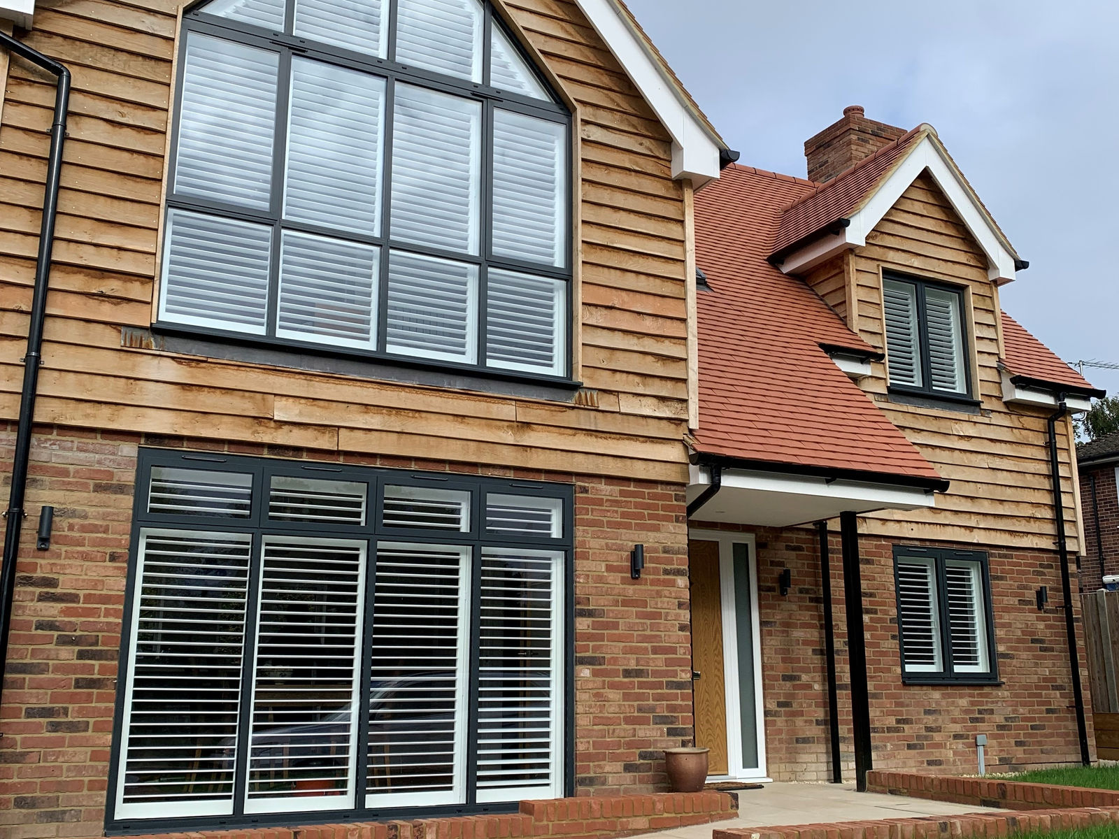 Apex and bi-fold door shutters on a new build
